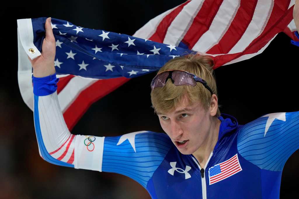 Gold medallist Jordan Stolz of the U.S. celebrates after the men&amp;apos;s 1,000 meters speedskating race at the 2026 Winter Olympics, in Milan, Italy, Wednesday, Feb. 11, 2026. (AP Photo/Luca Bruno)