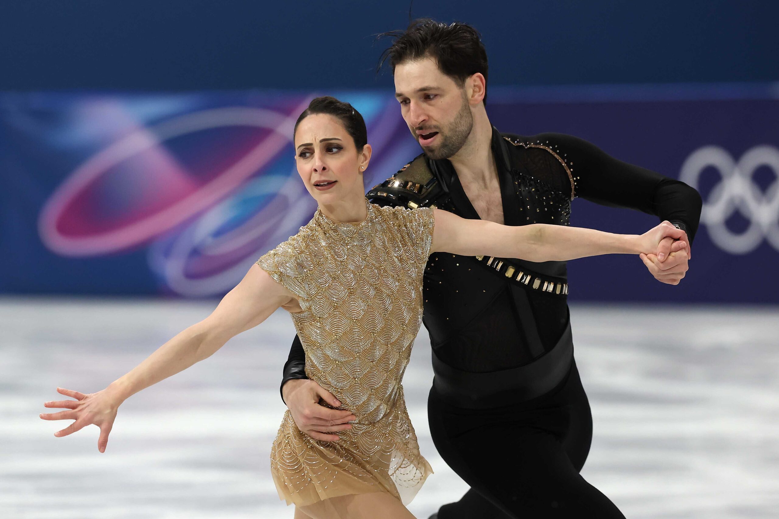 Deanna Stellato-Dudek and partner Maxime Deschamps of Team Canada compete in Pair Skating - Short Program on day nine of the Milano Cortina 2026 Winter Olympic Games at Milano Ice Skating Arena on Feb. 15, 2026, in Milan, Italy.