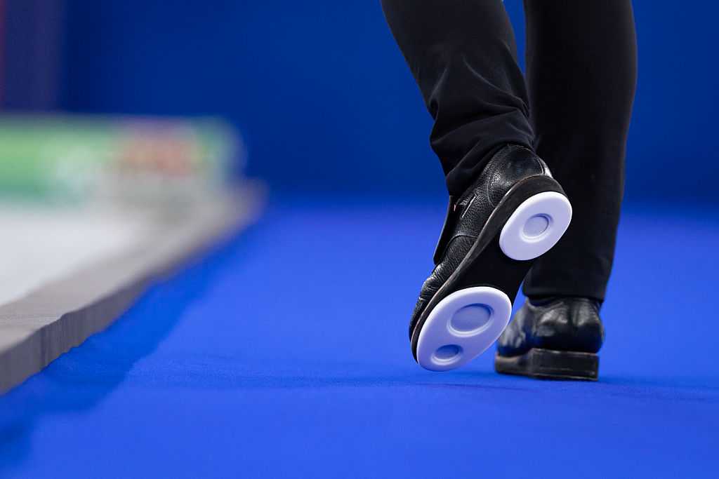 A general view of curling shoes during the curling mixed doubles round robin between Britain and Canada during the Milano Cortina 2026 Winter Olympic Games at the Cortina Curling Olympic Stadium in Cortina d&amp;apos;Ampezzo on February 7, 2026. (Photo by Odd ANDERSEN / AFP via Getty Images)