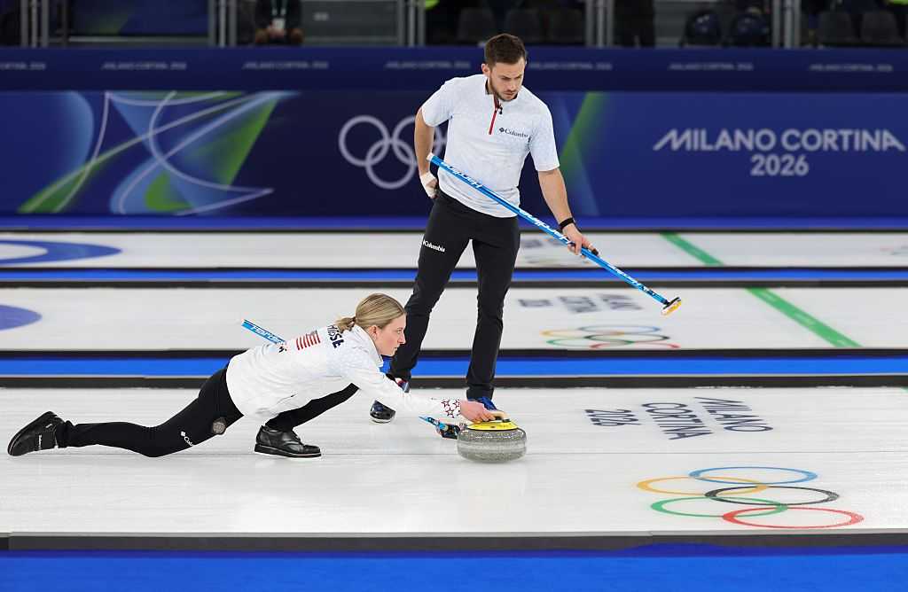 Cory Thiesse L and Korey Dropkin of the United States competes during the curling mixed doubles gold medal match between Sweden and the United States at the Milan-Cortina 2026 Olympic Winter Games in Cortina, Italy, Feb. 10, 2026. (Photo by Ding Xu/Xinhua via Getty Images)