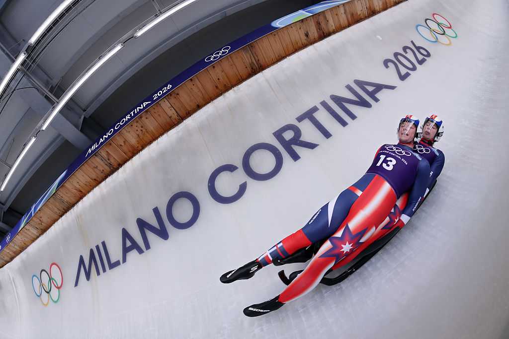 CORTINA D&amp;apos;AMPEZZO, ITALY - FEBRUARY 08: Marcus Mueller and Ansel Haugsjaa of Team United States compete in the Men&amp;apos;s Doubles Official Training Run 1 on day two of the Milano Cortina 2026 Winter Olympic games at Cortina Sliding Centre on February 08, 2026 in Cortina d&amp;apos;Ampezzo, Italy. (Photo by Richard Heathcote/Getty Images)