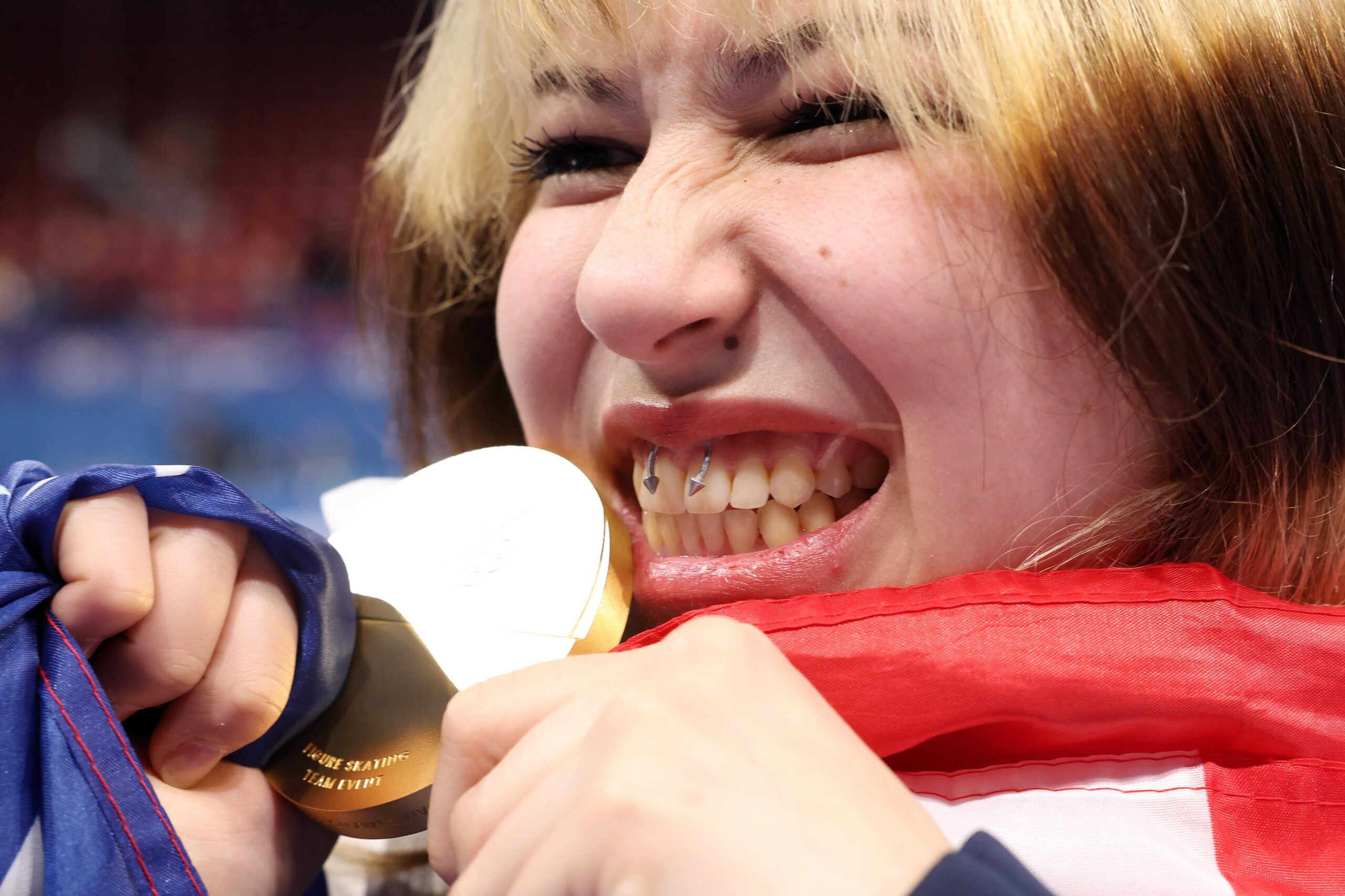 MILAN, ITALY - FEBRUARY 08: Gold medalist Alyssa Liu of Team United States celebrates with her medal following the Medal Ceremony for the Team Event after the Men's Single Skating - Free Skating Team Event on day two of the Milano Cortina 2026 Winter Olympic games at Milano Ice Skating Arena on February 08, 2026 in Milan, Italy. (Photo by Jamie Squire/Getty Images)
