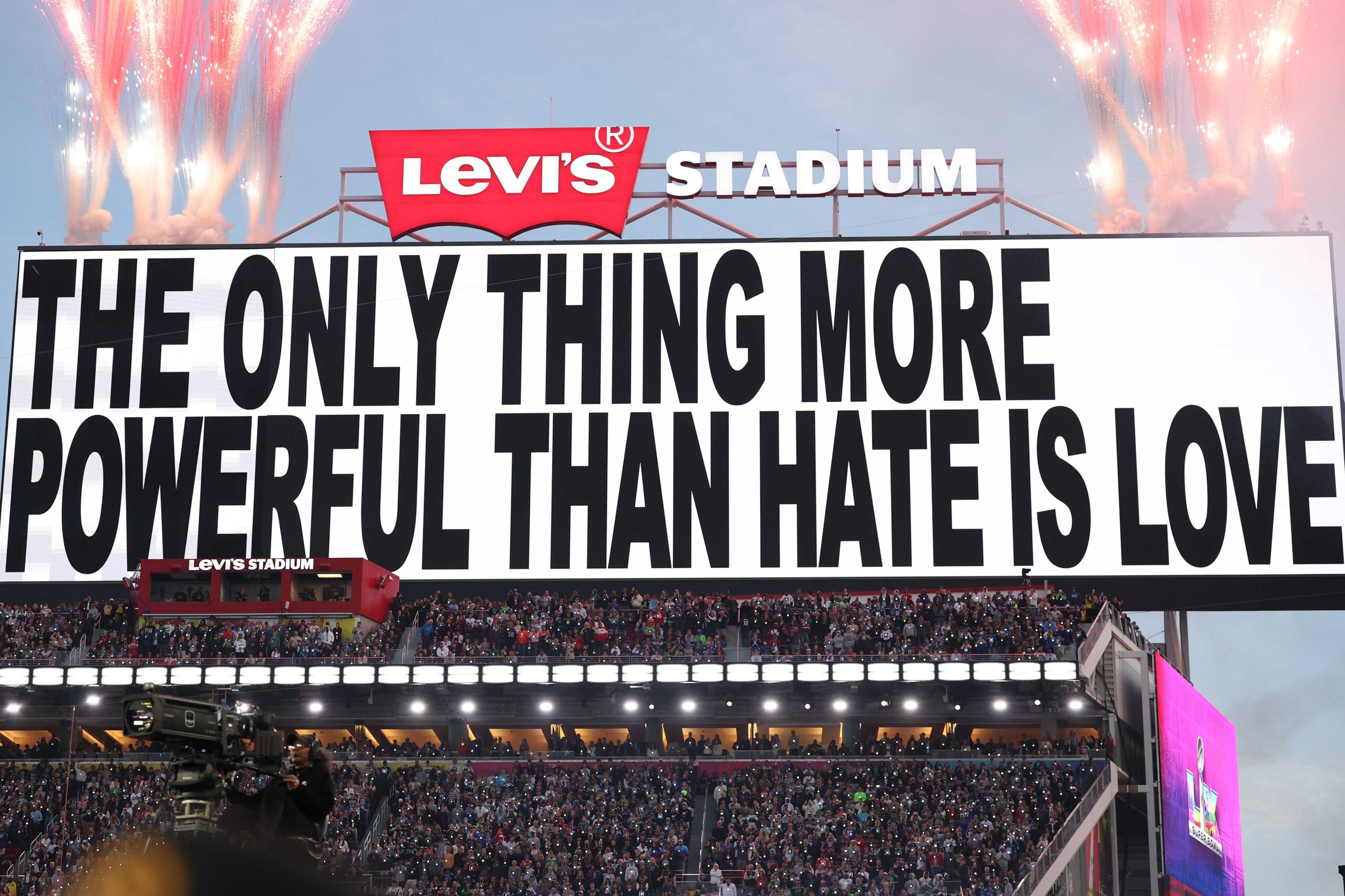 SANTA CLARA, CALIFORNIA - FEBRUARY 08: Signage that reads &amp;quot;The Only Thing More Powerful than Hate is Love&amp;quot; is displayed on the scoreboard during the Apple Music Super Bowl LX Halftime Show at Levi&amp;apos;s Stadium on February 08, 2026 in Santa Clara, California. (Photo by Kevin C. Cox/Getty Images)