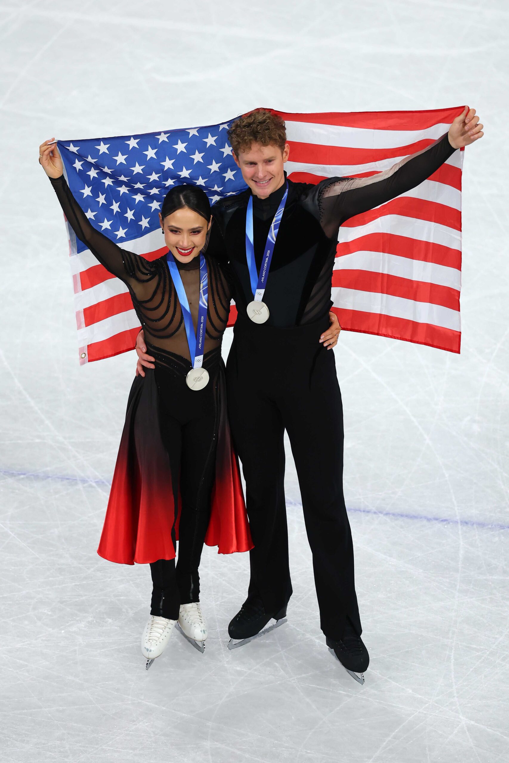 Silver medalists Madison Chock and partner Evan Bates of Team United States pose for a photo after the medal ceremony for Ice Dance on day five of the Milano Cortina 2026 Winter Olympic Games at Milano Ice Skating Arena on February 11, 2026, in Milan, Italy.