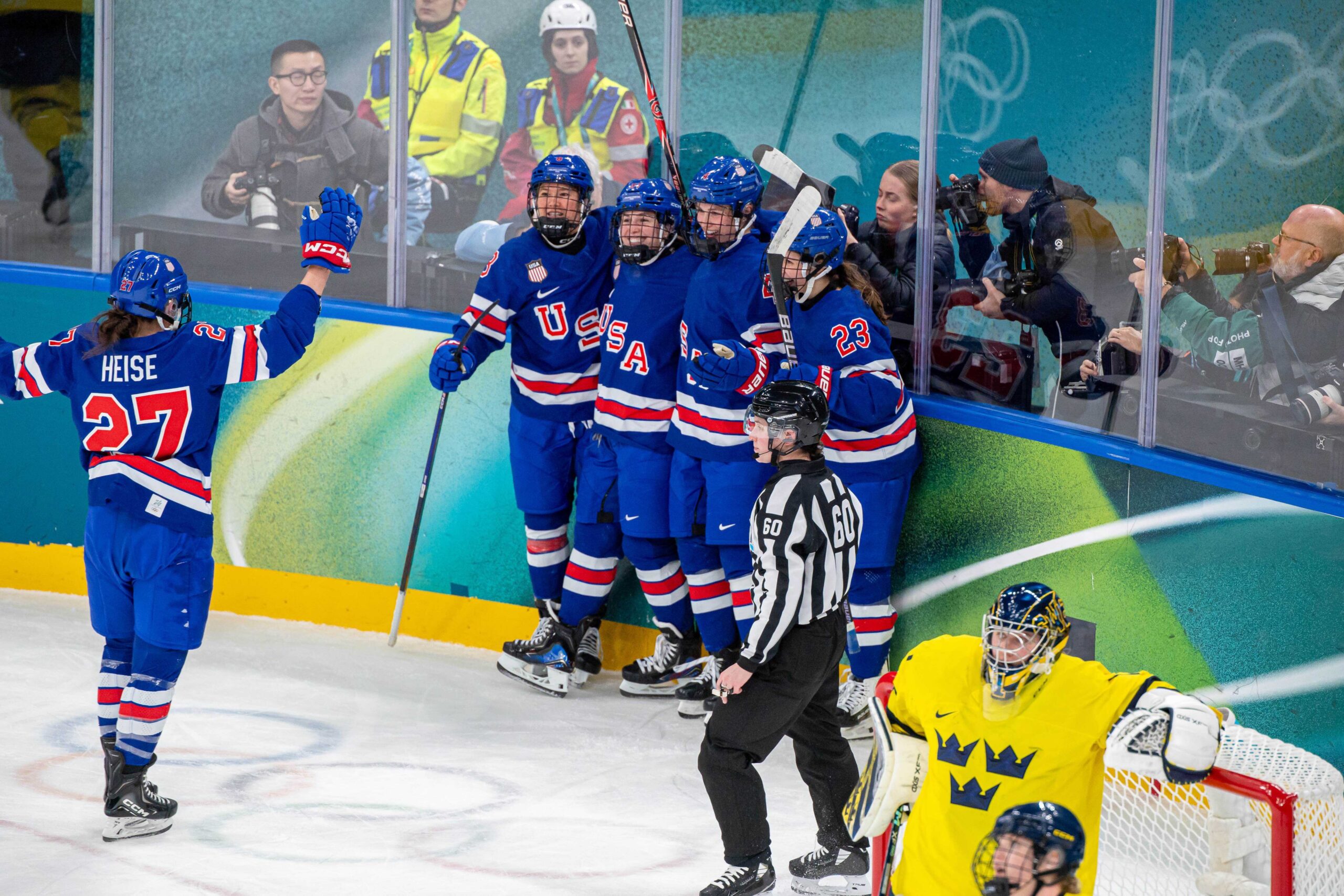 Abbey Murphy #37 of the United States celebrates her goal with teammates during the Women's semifinal match between the United States and Sweden on day ten of the Milano Cortina 2026 Winter Olympic Games at Milano Santagiulia Ice Hockey Arena on February 16, 2026, in Milan, Italy.