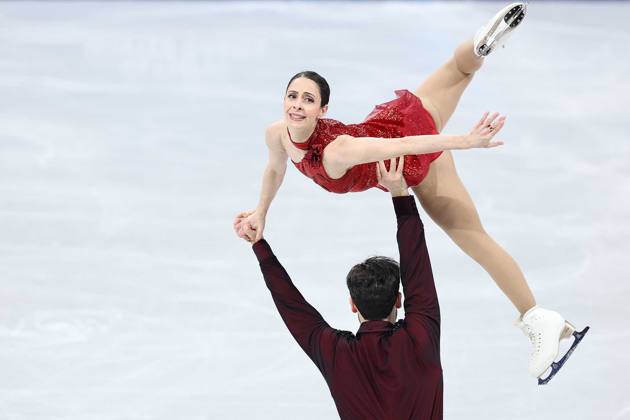Deanna Stellato-Dudek and Maxime Deschamps of Team Canada perform during the Pair Figure Skating Free on day ten of the Milano Cortina 2026 Winter Olympic Games at Milano Ice Skating Arena on Feb. 16, 2026, in Milan, Italy.