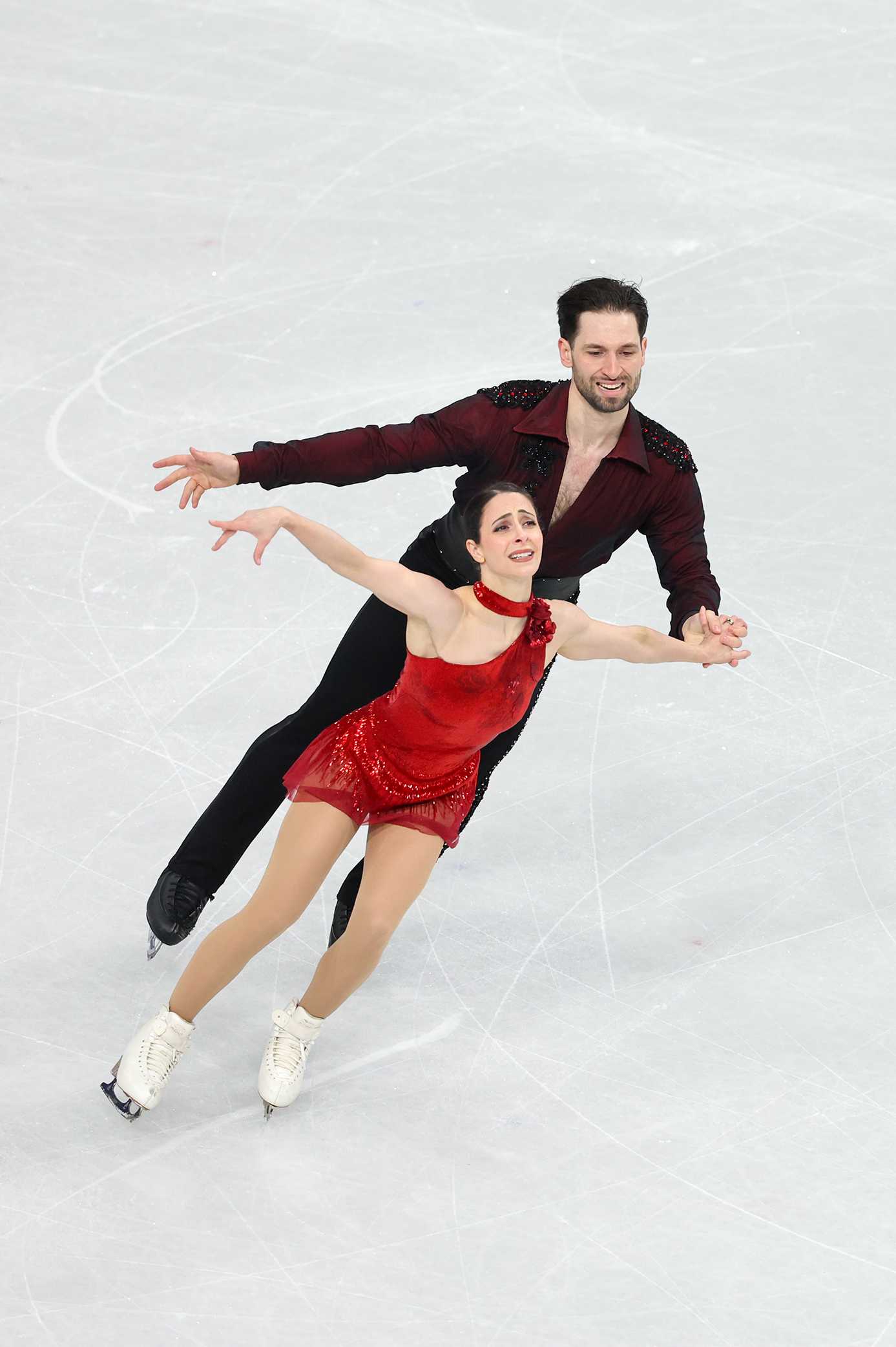 Deanna Stellato-Dudek and partner Maxime Deschamps of Team Canada compete during Pair Skating - Free Skating on day ten of the Milano Cortina 2026 Winter Olympic Games at Milano Ice Skating Arena on February 16, 2026, in Milan, Italy.