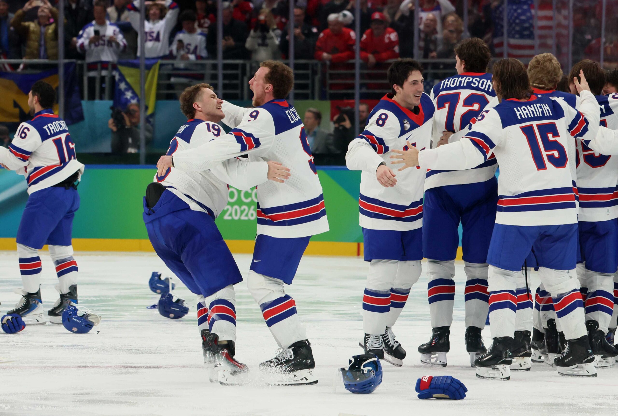 Matthew Tkachuk #19, Jack Eichel #9 of Team United States and teammates celebrate their gold medal win during the Men's Gold Medal match between Canada and the United States on day 16 of the Milan Cortina 2026 Winter Olympic Games at Milano Santagiulia Ice Hockey Arena on February 22, 2026 in Milan, Italy.