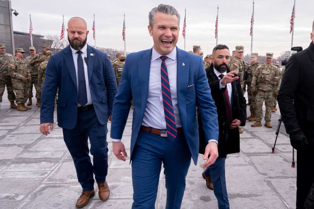 Defense Secretary Pete Hegseth leaves an oath of enlistment ceremony, Friday, Feb. 6, 2026, held on the base of the Washington Monument in Washington.
