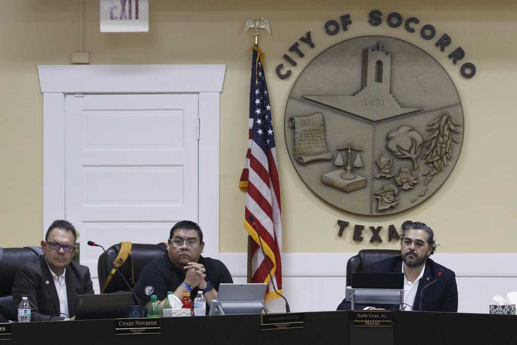 Mayor Rudy Cruz Jr., right, listens to public comments at a City Council meeting on Wednesday, Feb. 11, 2026, in Socorro, Texas, regarding the purchase of three hulking warehouses in connection with U.S. Immigration and Customs Enforcement&amp;apos;s expansion of immigrant detention centers.