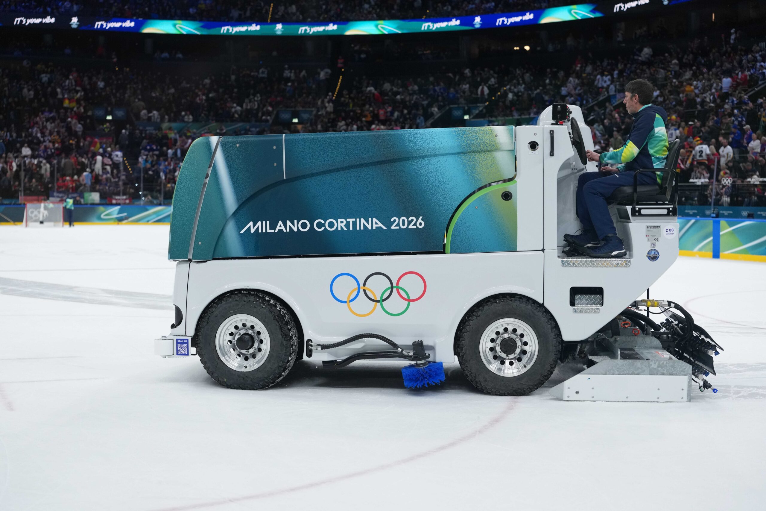 A Zamboni machine resurfaces the ice during an intermission in a men's ice hockey Group C match between the USA and Germany at the Milano Santagiulia Ice Hockey Arena during the Milano-Cortina 2026 Winter Olympic Games in Milan, Italy, on Feb. 15, 2026.