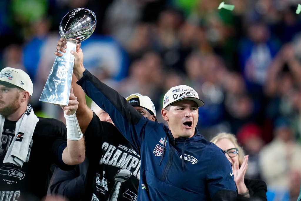 Seattle Seahawks head coach Mike MacDonald hold the Lombardi Trophy after defeating the New England Patriots the NFL Super Bowl 60 football game, Sunday, Feb. 8, 2026, in Santa Clara, Calif.