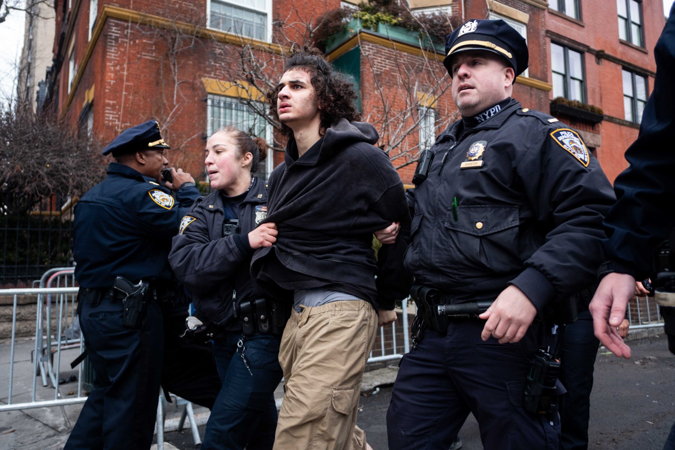 Police detain Emir Balat after he attempted to detonate an improvised explosive device during a counterprotest against far-right influencer Jake Lang staging an anti-Islam protest outside Gracie Mansion, Saturday, March 7, 2026, in New York.