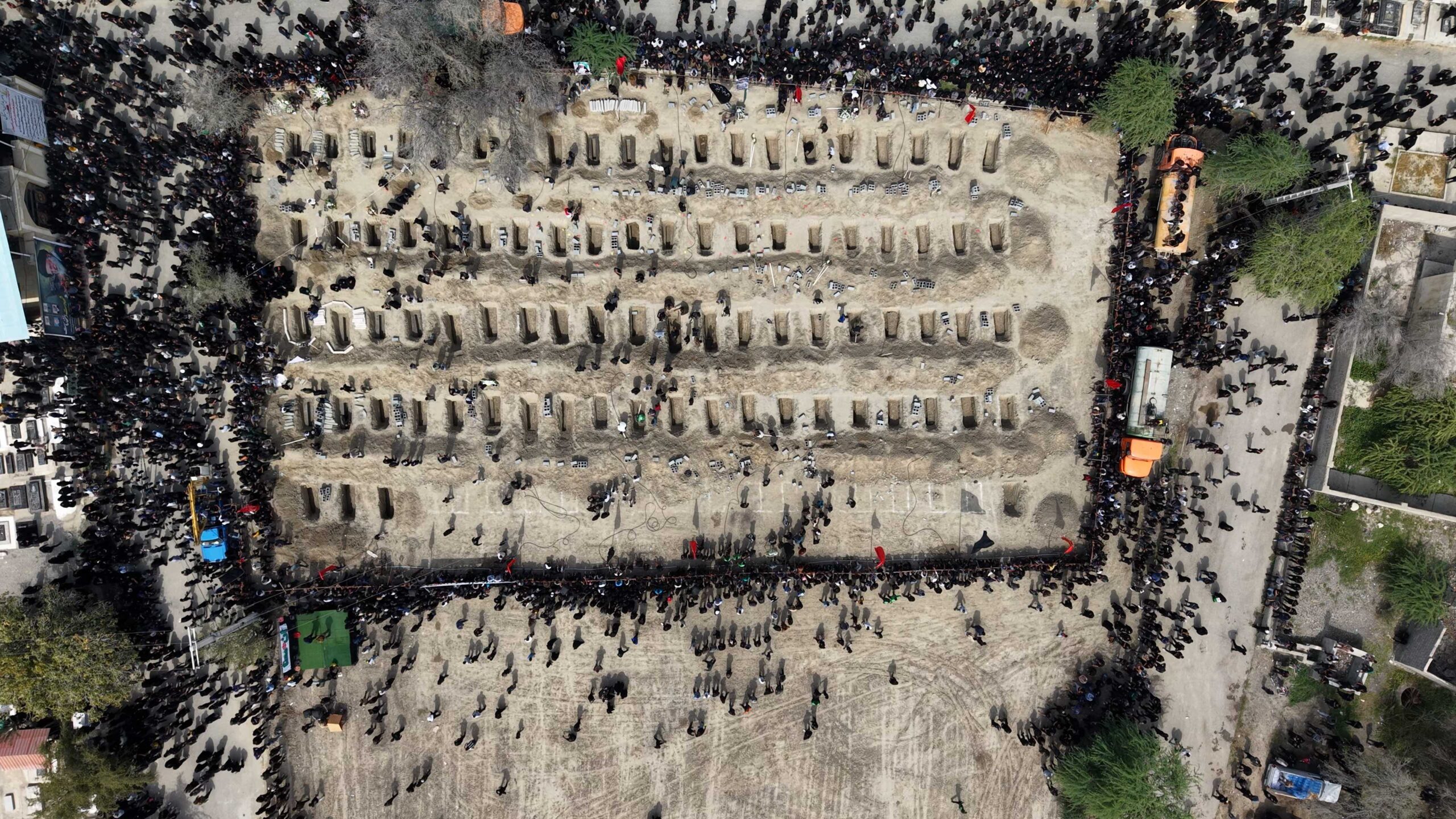 MINAB, IRAN - MARCH 3: (EDITOR&amp;apos;S NOTE: Getty Images provides access to this publicly distributed image for editorial purposes and is not the copyright owner. Additional permissions may be required and are the sole responsibility of the end user.) An aerial view of a graveyard as funerals are held for students and staff from a girls&amp;apos; school, who authorities said were killed in a US-Israeli strike on February 28, on March 3, 2026 in Minab, Iran. Iranian authorities said that over 160 people were killed in the blast, which occurred on the first day of the joint US-Israeli attack on sites across Iran. US officials say they were looking into reports of the incident at the school, which was adjacent to an Islamic Revolutionary Guard Corps (IRGC) base. (Photo by Handout/Getty Images)
