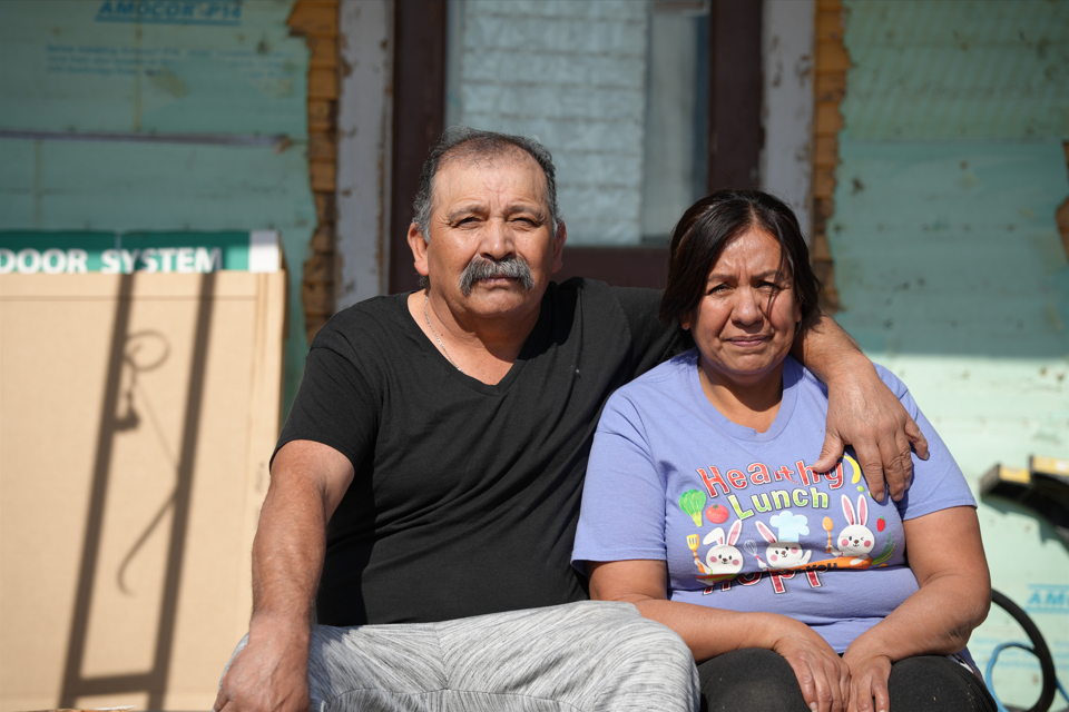 constancia and maria at front of home