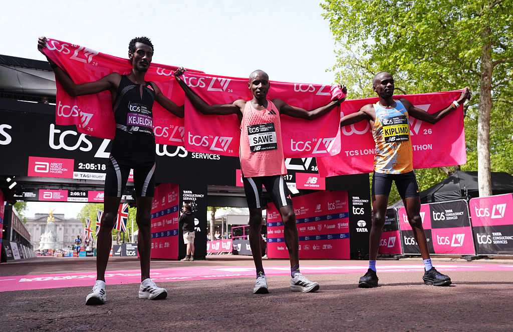 Sabastian Sawe (centre), Yomif Kejelcha (left) and Jacob Kiplimo (right) after the Men&amp;apos;s elite race during the 2026 TCS London Marathon. Picture date: Sunday April 26, 2026. (Photo by John Walton/PA Images via Getty Images)