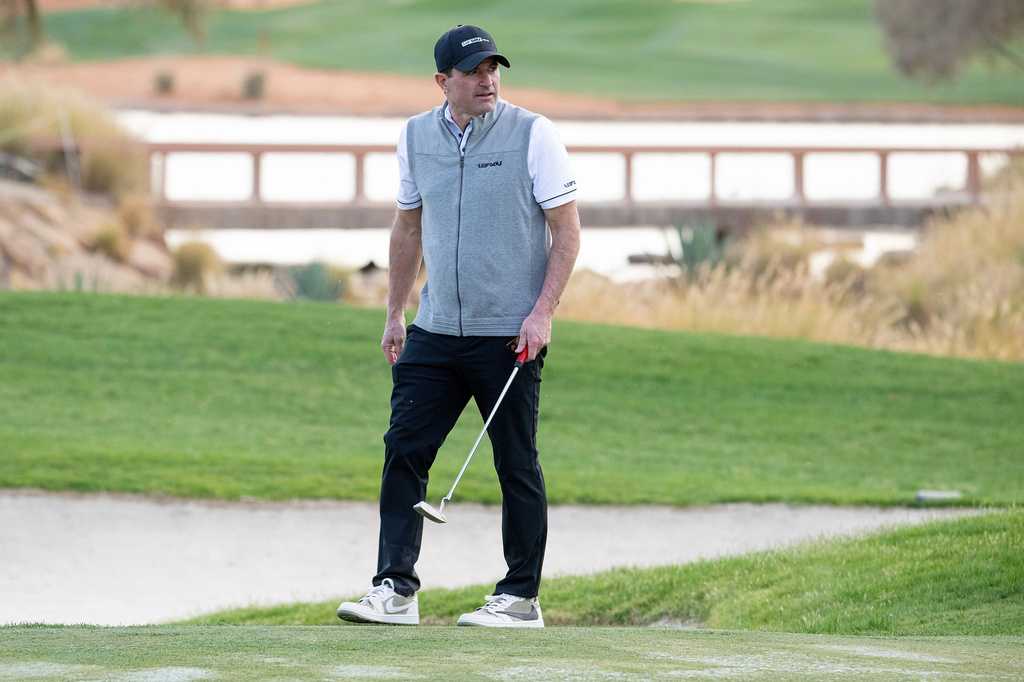 FILE - LIV Golf CEO Scott O&amp;#39;Neil is seen on the course during the pro-am before the start of LIV Golf tournament at Riyadh Golf Club, Feb 5, 2025 in Riyadh, Saudi Arabia.