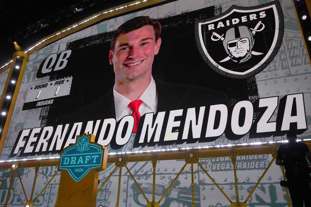 Indiana quarterback Fernando Mendoza is shown on a screen after being chosen by the Las Vegas Raiders with the first overall pick during the first round of the NFL football draft, Thursday, April 23, 2026, in Pittsburgh.
