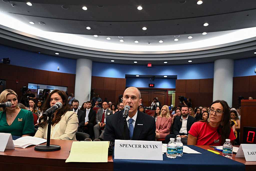 US lawyer Spencer Kuvin (2R) speaks, flanked by Founder and national director of World Without Exploitation Lauren Hersh (R), during a Democrat-led US House Oversight field hearing on the Epstein investigation in West Palm Beach, Florida, on May 12, 2026. The Epstein saga has continued to roil American and British politics, as documents related to the expansive investigation into the financier&amp;apos;s life have been released in previous months. Epstein admitted sex crimes in 2008 under a controversial plea agreement and was later charged with trafficking underage girls before dying in a New York jail cell in 2019 while awaiting trial. His death was ruled a suicide. (Photo by CHANDAN KHANNA / AFP via Getty Images)