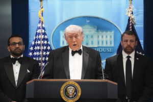 U.S. President Donald Trump speaks during a press conference while flanked by FBI Director Kash Patel and Secretary of Homeland Security Markwayne Mullin in the Brady Briefing Room of the White House on April 25, 2026 in Washington, DC. (Photo by Nathan Howard/Getty Images)