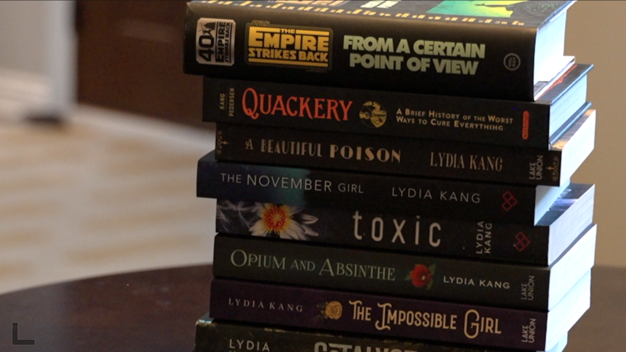 Collection of Lydia Kang's Books in Settlement